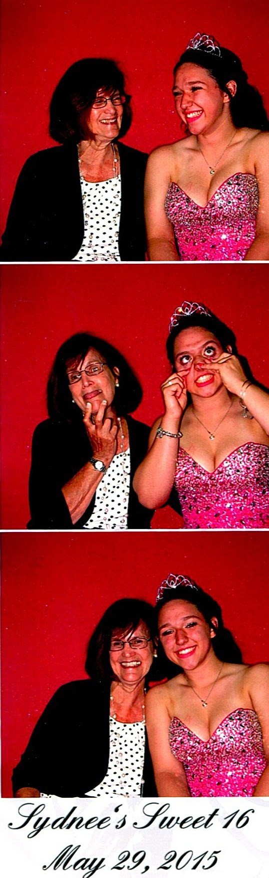 Ann Filipone laughing with a teenager in a photo booth at a sweet sixteen celebration